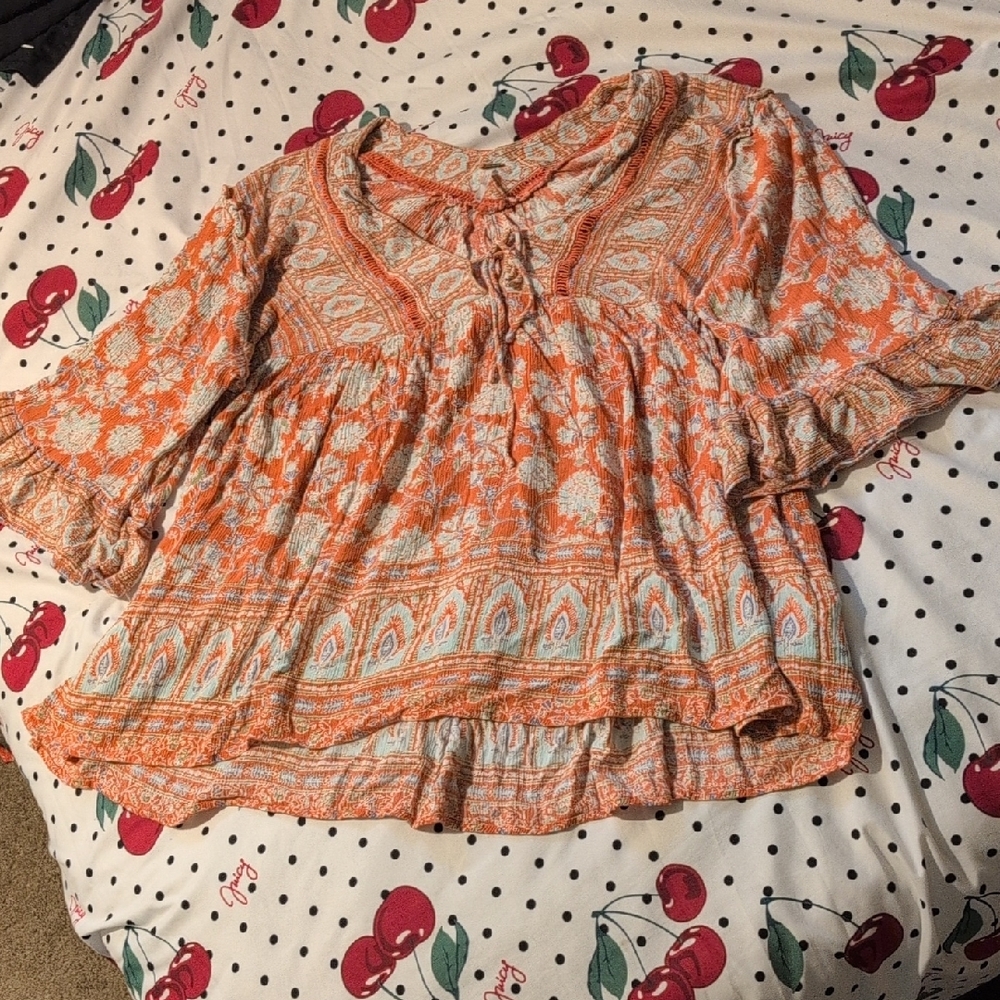 Free People Flutter Sleeve Blouse in Orange with Ruffled Tie Front